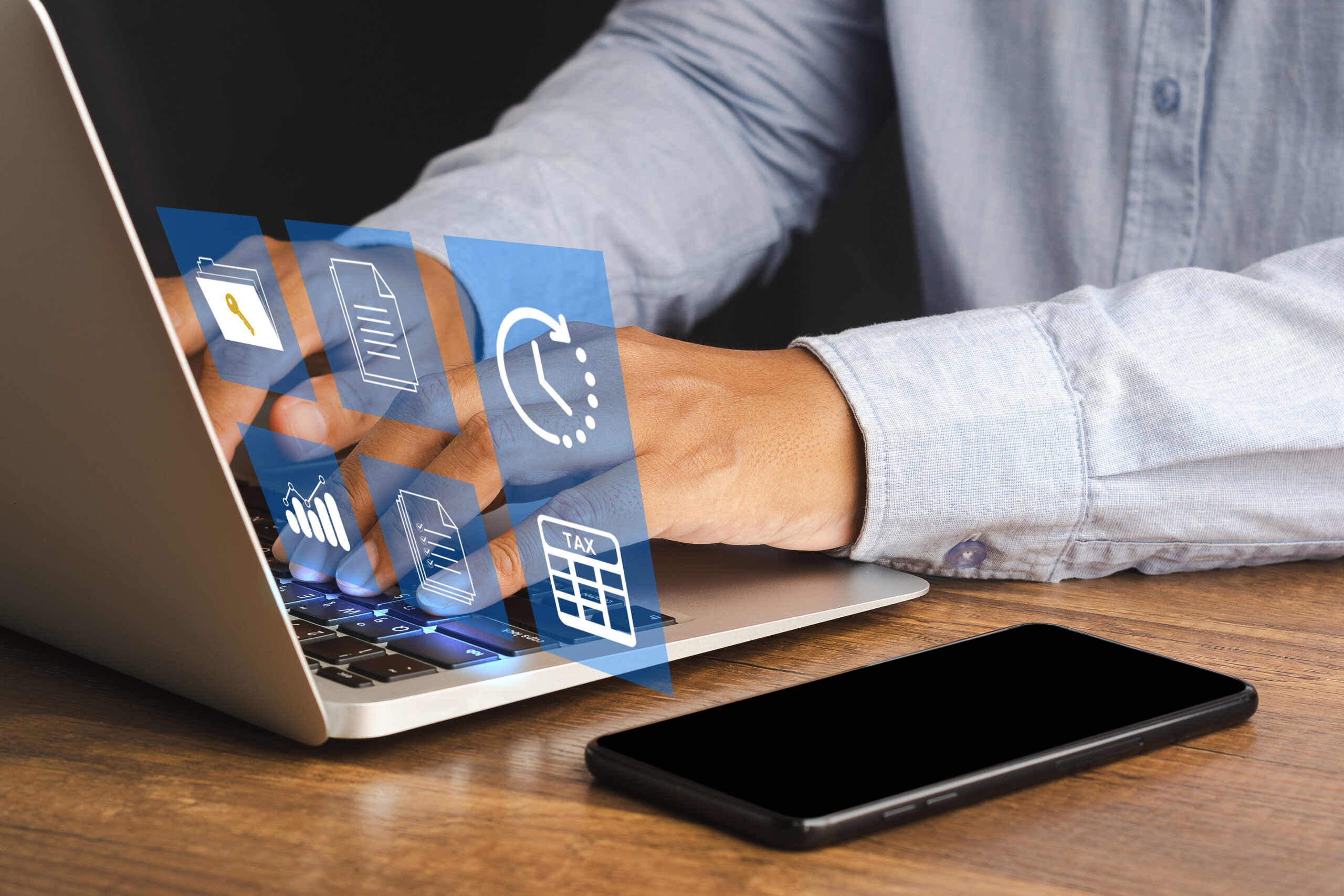 Businessman Working on Payroll Service Using His Laptop